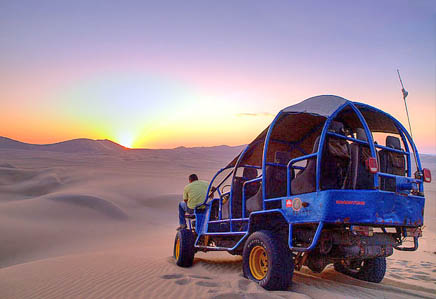 A Dune buggy and sandboarding tour