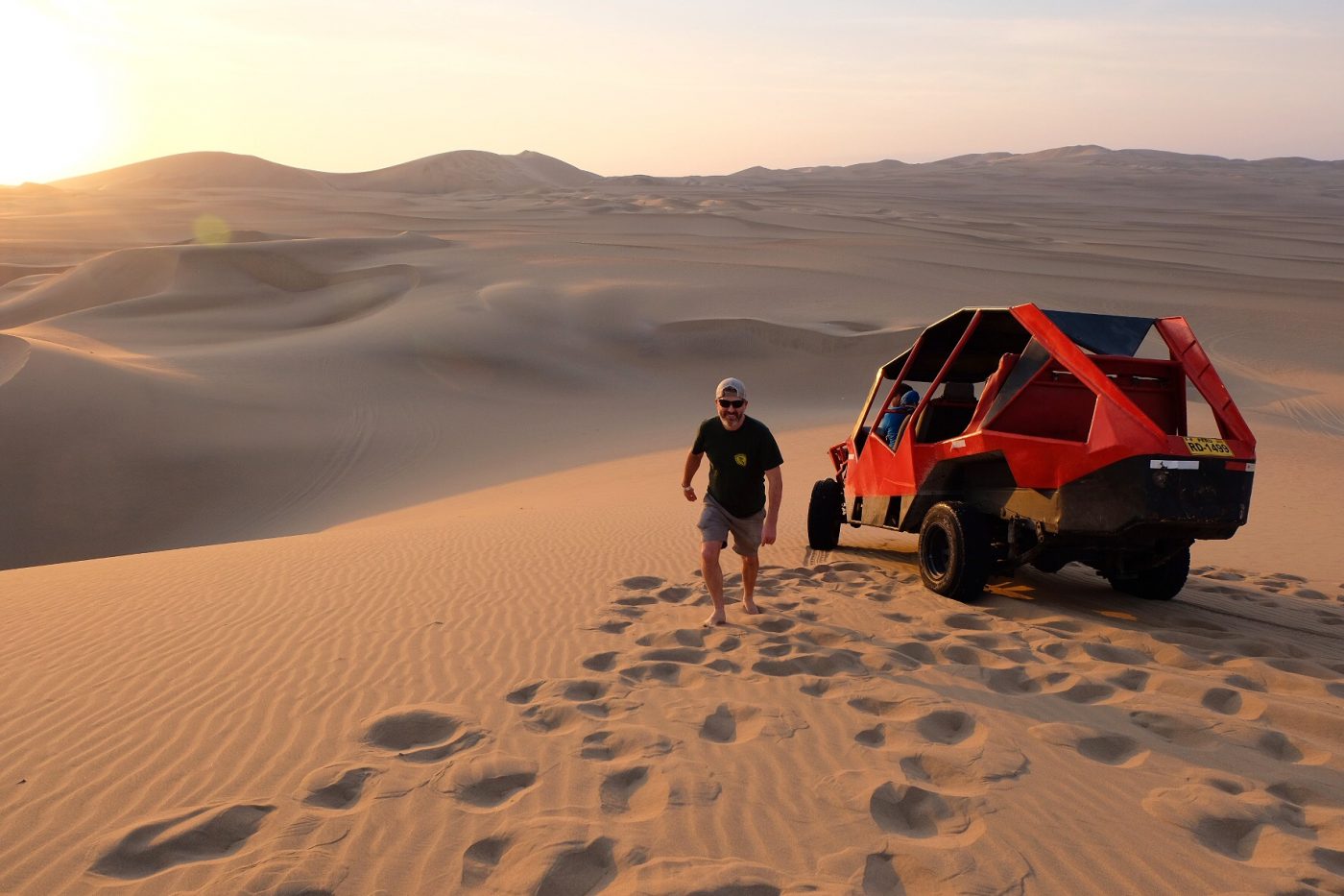 Traveler enjoying a desert road trip through southern Peru