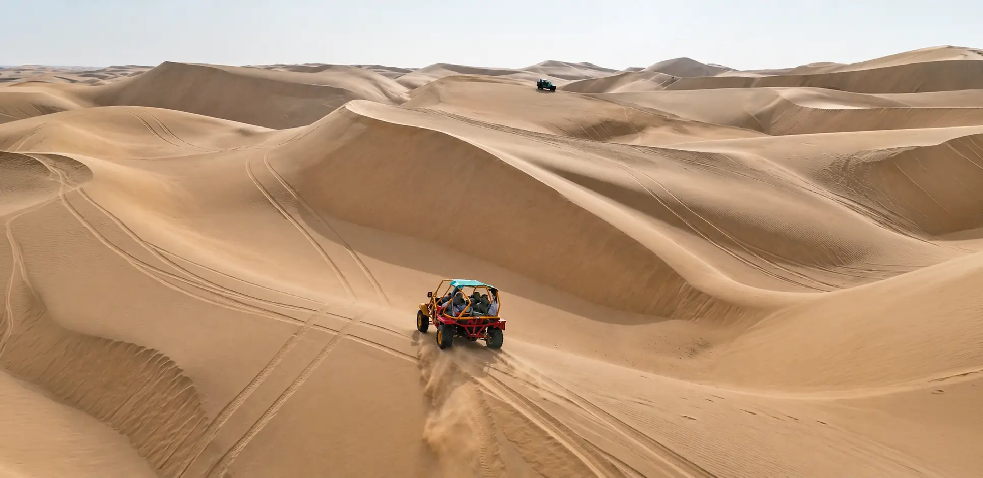 Dune buggy crossing the sand dunes near Huacachina Oasis