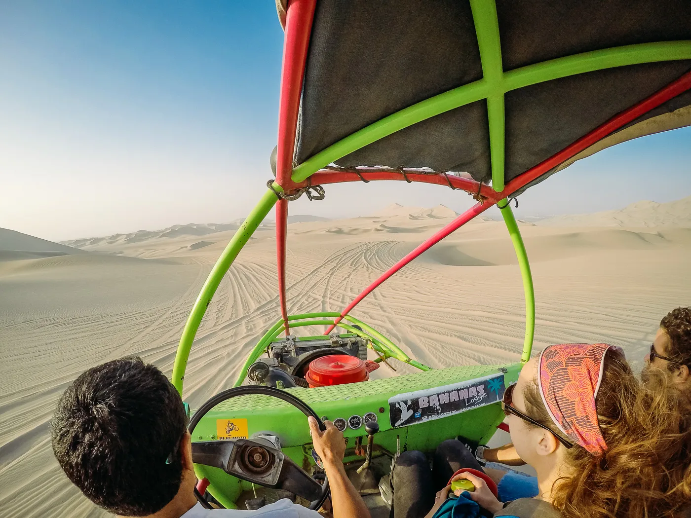 Dune buggy crossing the sand dunes near Huacachina