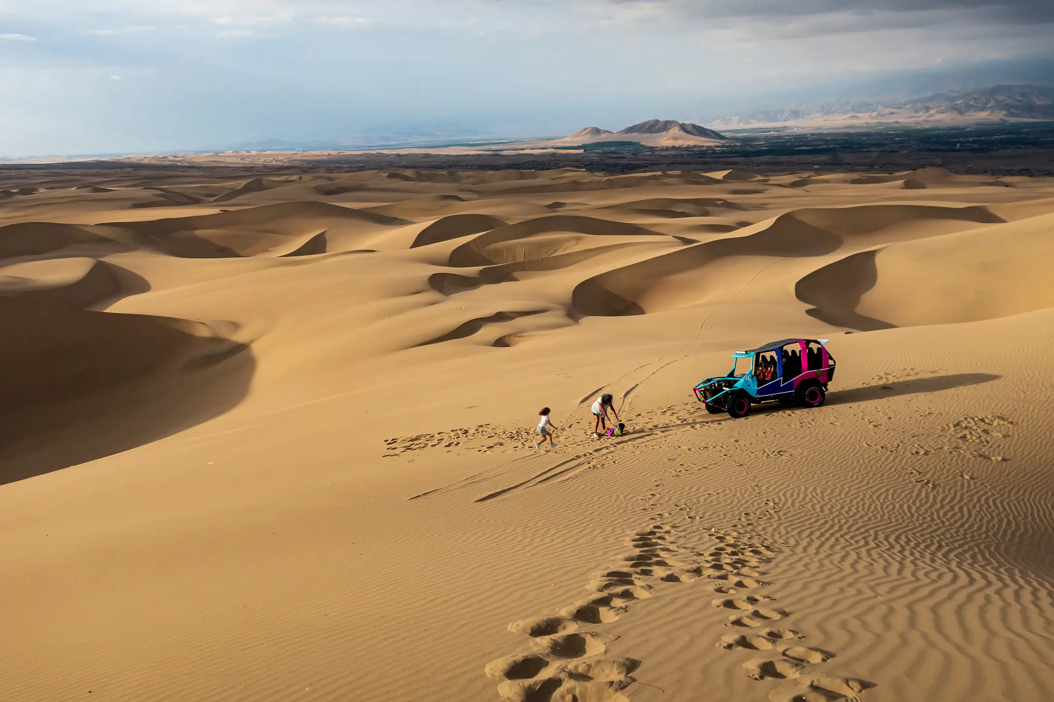Family dune buggy experience in the desert near Huacachina