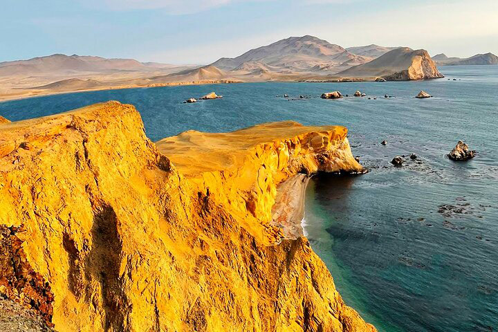 Golden desert cliffs in Paracas National Reserve